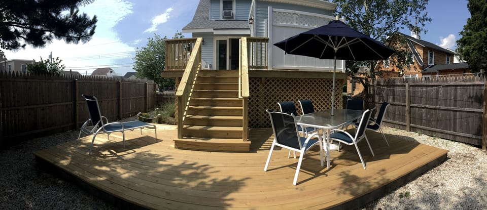 New deck and stairs since the house was raised.