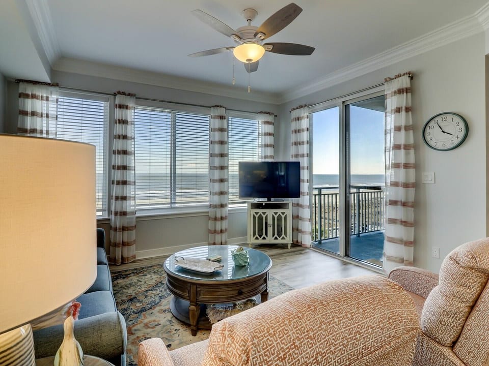 Living Room with Ocean Views and Balcony Access at 3404 Sea Crest