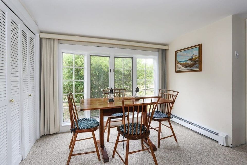 The cottage dining area adjacent to the living room.