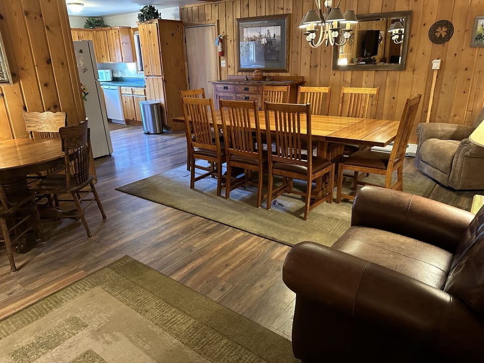 View from front door. Dining Room, Kitchen, and door to Annex Suite. 2 Lazy Boys