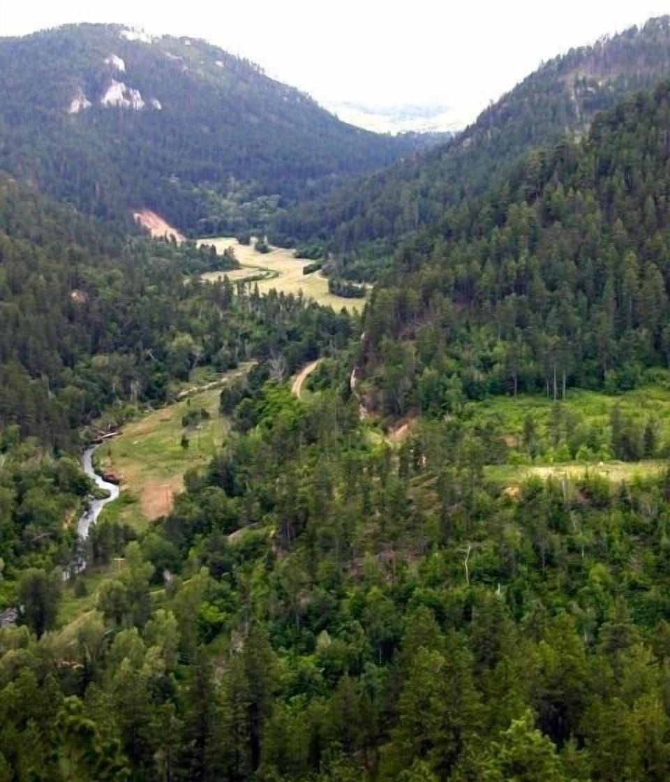 Enjoy hiking, fishing, gold-panning or swimming in beautiful Whitewood Canyon