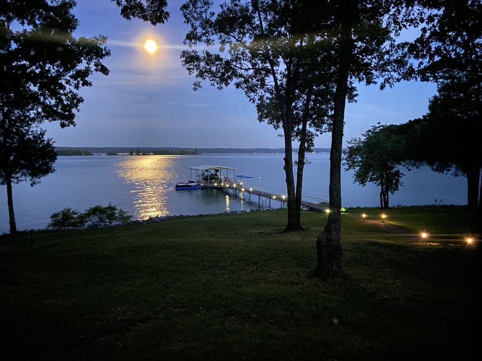 A full moon over the dock in July.