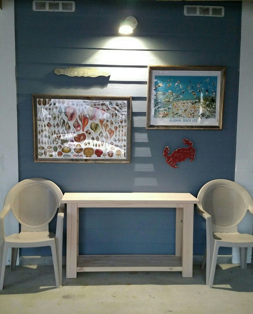 Back/under house a great place to sort and identify your shells and to relax!