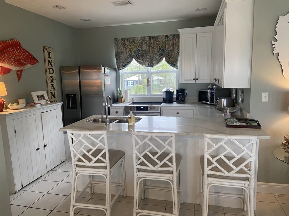 Updated appliances and seating make cooking and gathering a breeze 