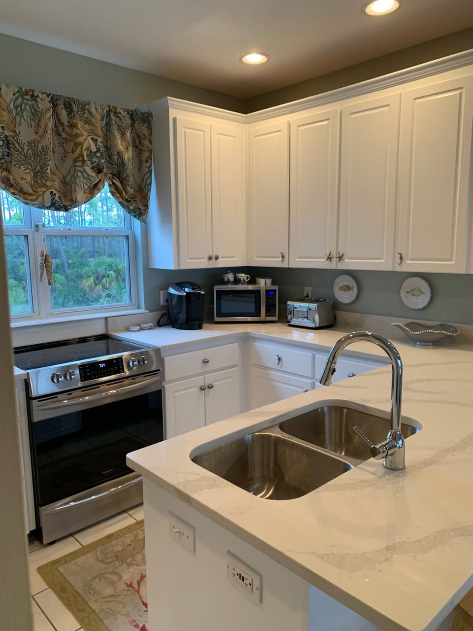 All new Quartz countertops, sink, and fixtures 