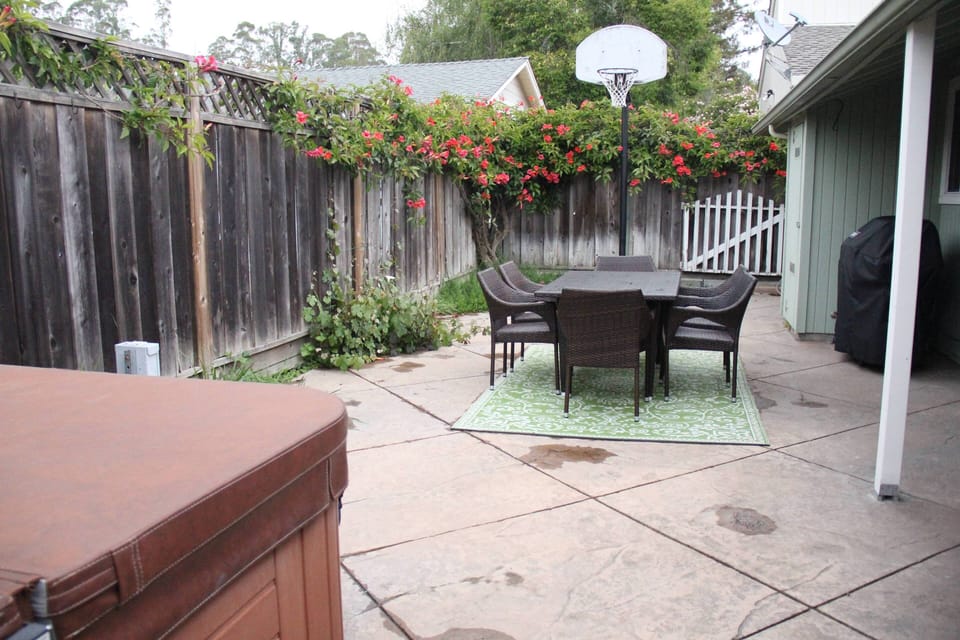 Outdoor dinette with Weber gas grill.