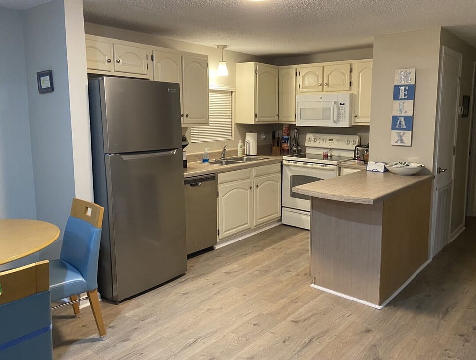 The kitchen is fully equipped to cook and serve meals 