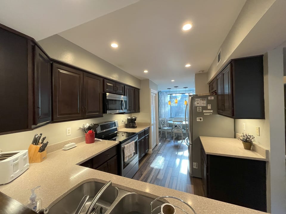 A view of the kitchen and breakfast nook beyond