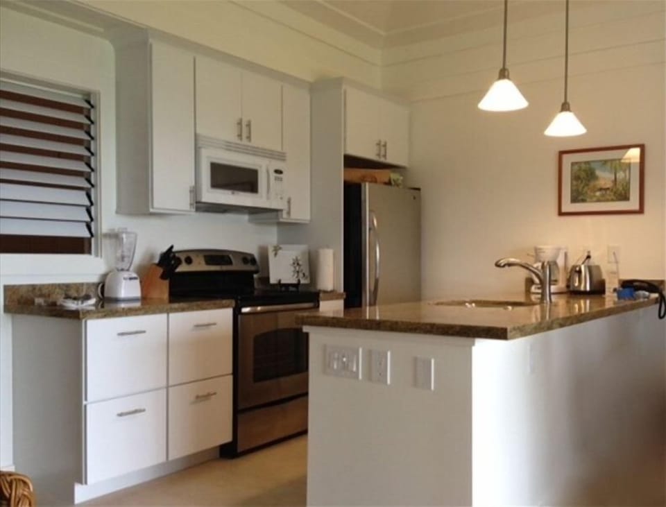 Updated kitchen with new appliances and granite counter tops