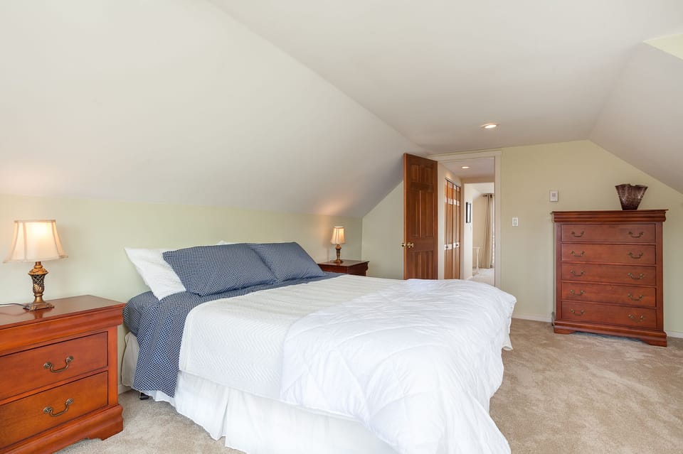 Another view of the upper level primary bedroom