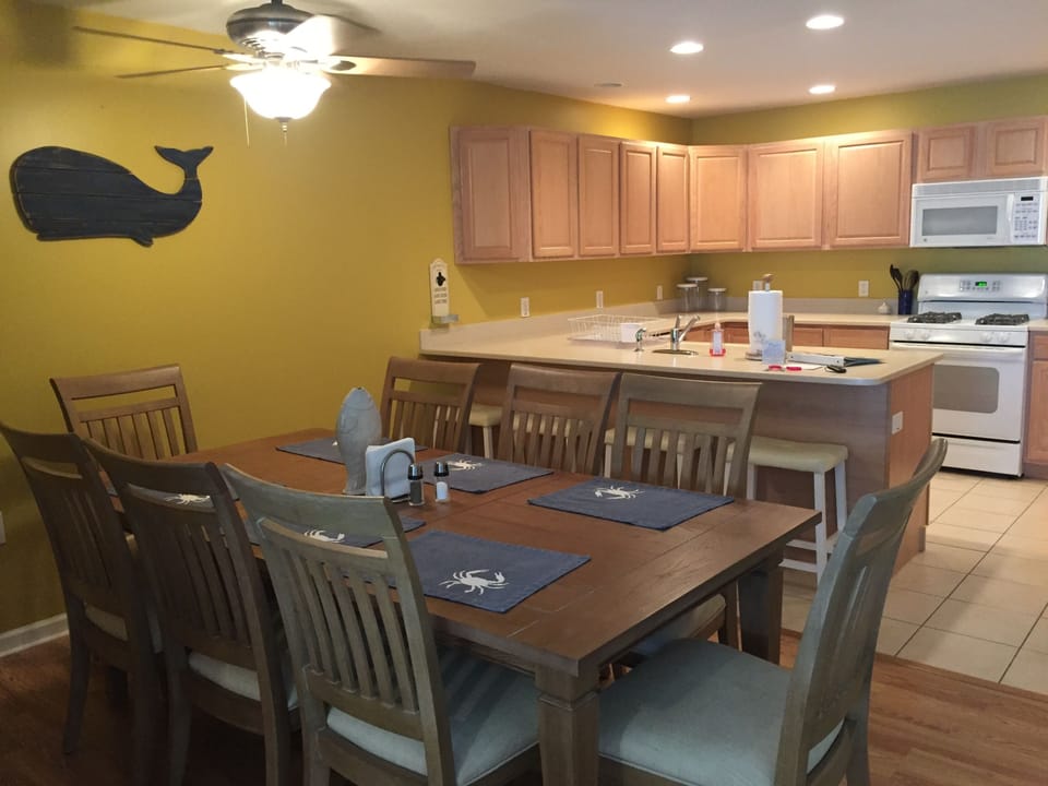 Open concept kitchen, living, and dining space.