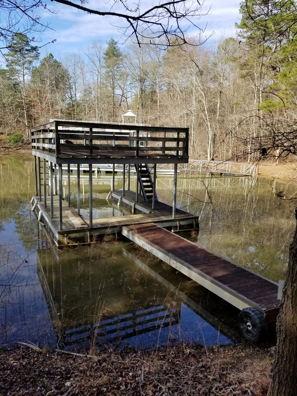 Dock with party deck.  Only feet from the house. 