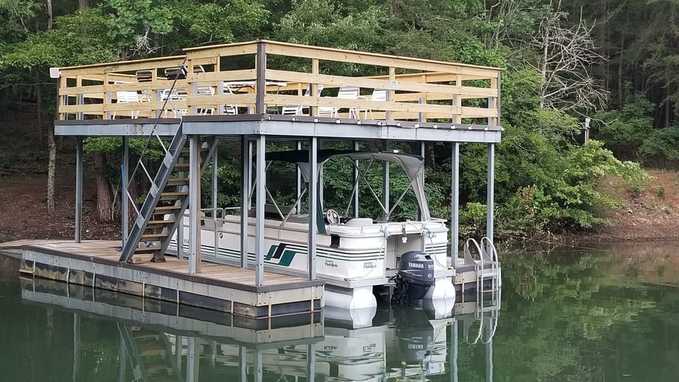 Party dock and pontoon boat (boat available for rent for an additional fee).