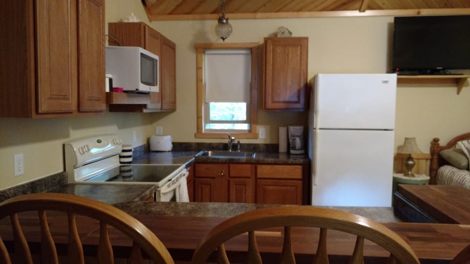 Fully stocked eat in kitchen