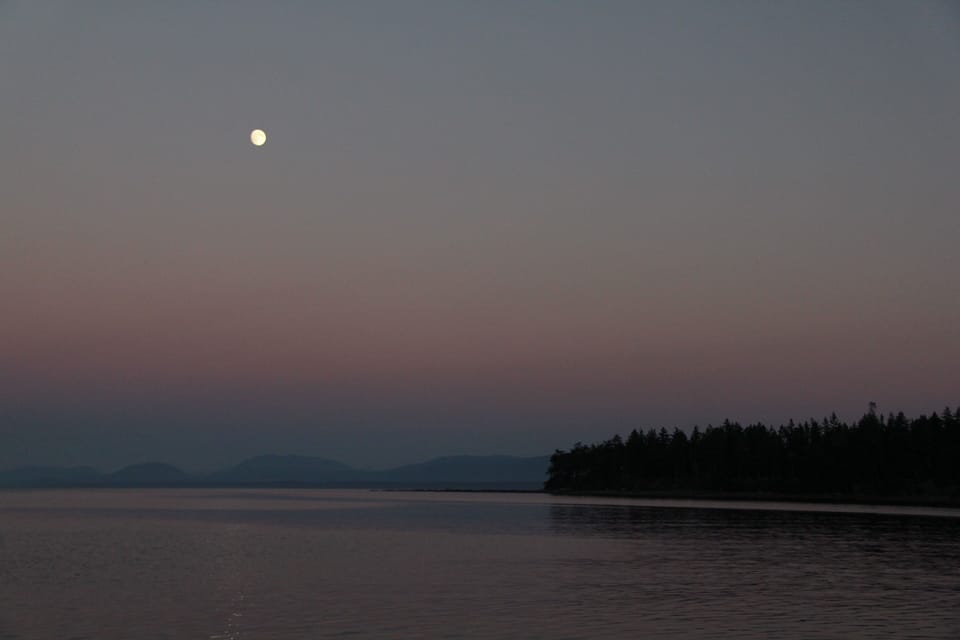 Full moon and pink skies over Qualicum Bay from deck.
