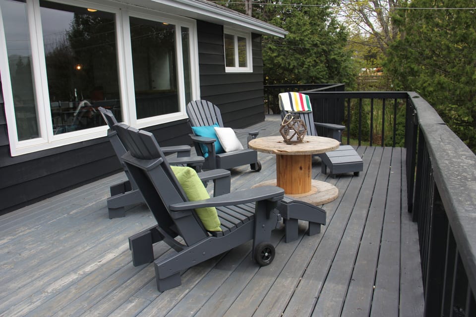 Spacious deck with sitting area (and dining area shown in other photo)