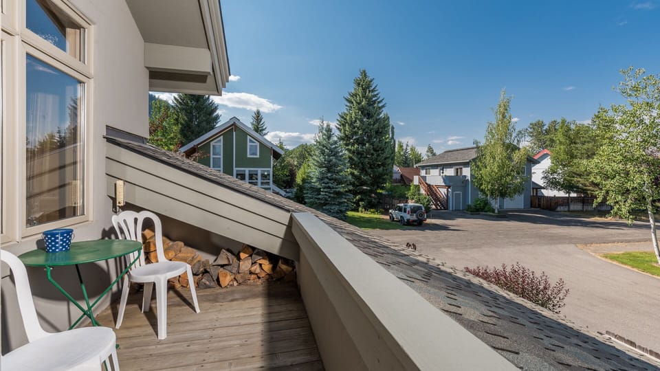 Upstairs deck off of living area with views toward town and  White Clouds. 