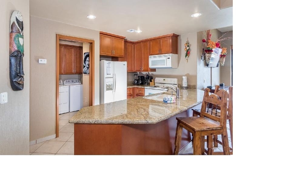 Fully equipped kitchen with Granite counter top.