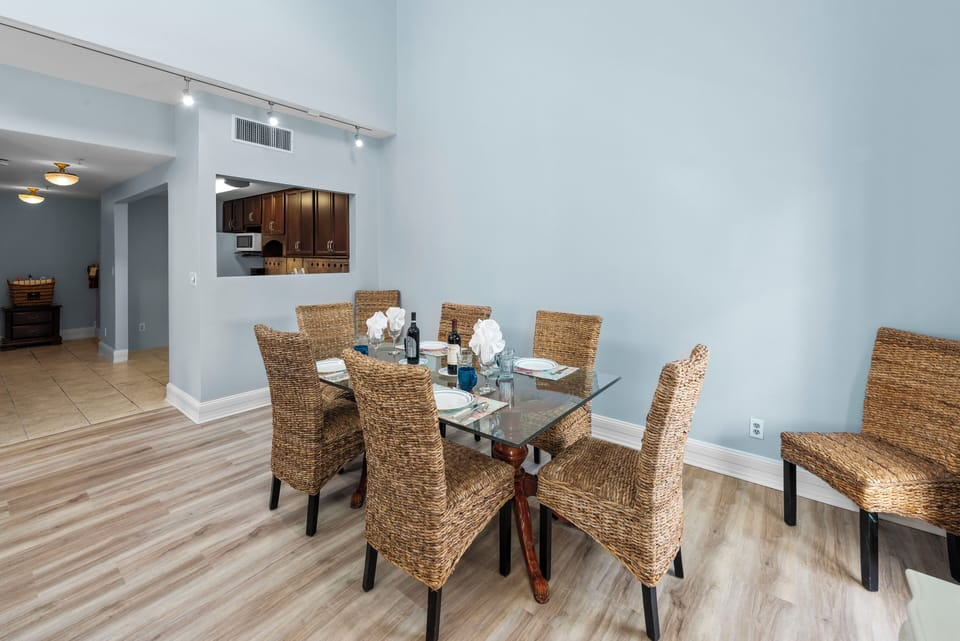 Dining and hallway to kitchen and bath.
