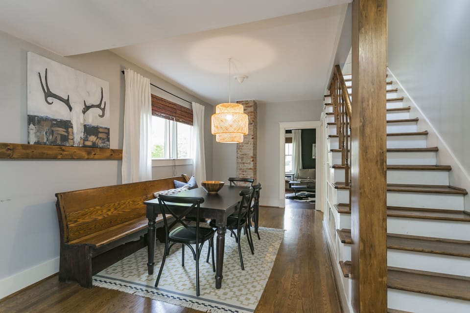 Dining room is between living room #2 and kitchen at the base of the stairs