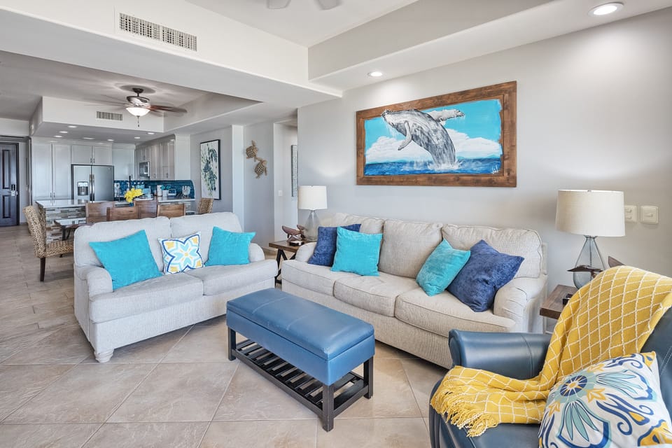 Comfortable living area with sofa sleeper, love seat and recliner chair