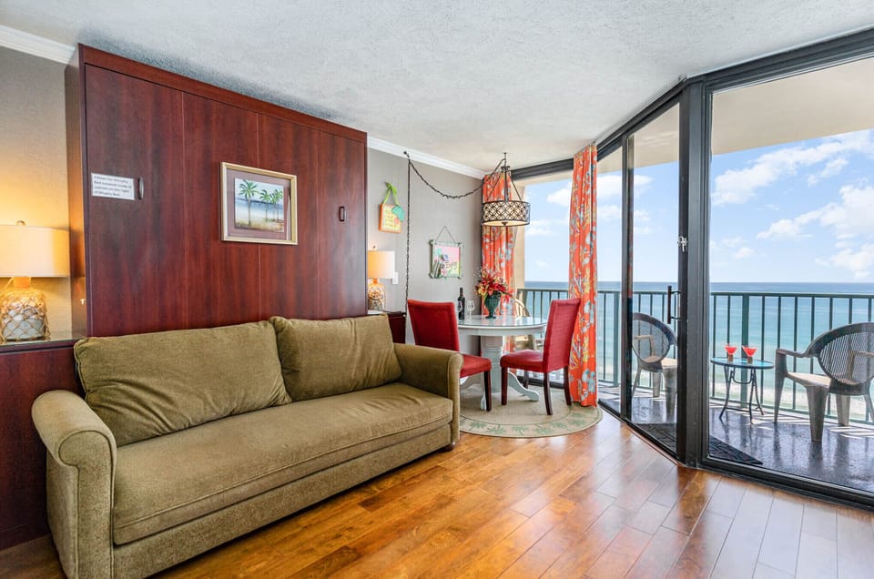 Living room/murphy bed overlooking the beach!