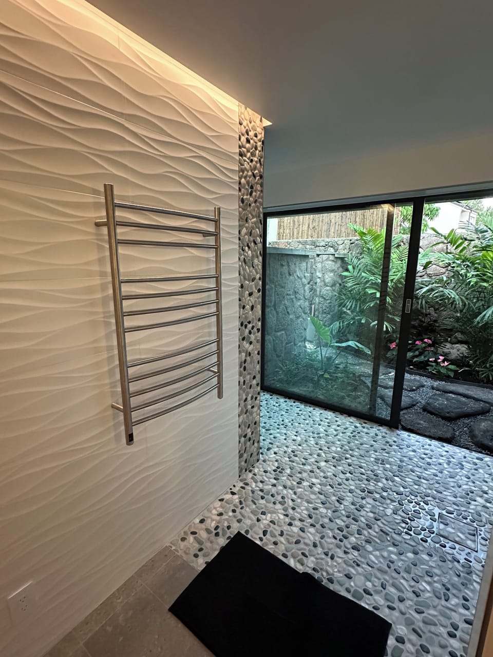 Heated towel bars in all bathrooms keep towels fresh and dry