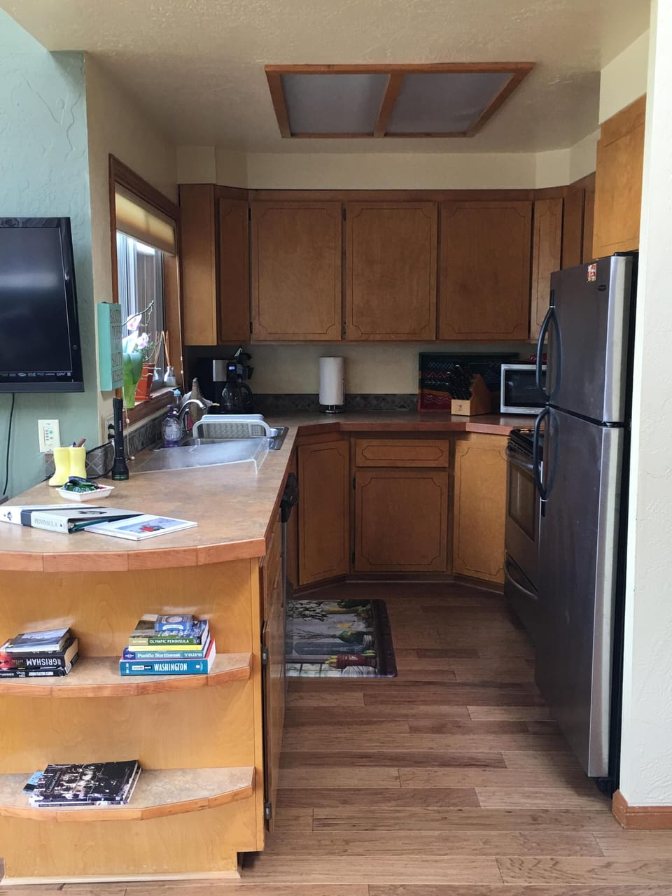 small kitchen with a view of the lake