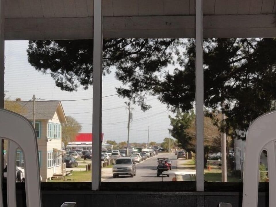 View from front porch down 1st Avenue to beach and amusement rides in summer.