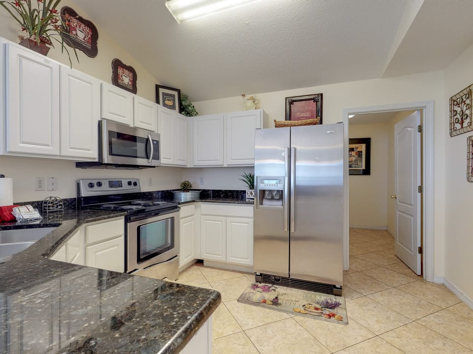 Spaciously Equipped Kitchen with Double Door Refrigerator