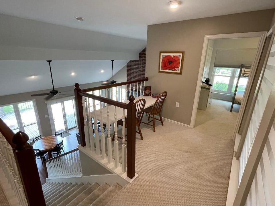 Desk on loft is great for game play or the perfect space for work check-ins.