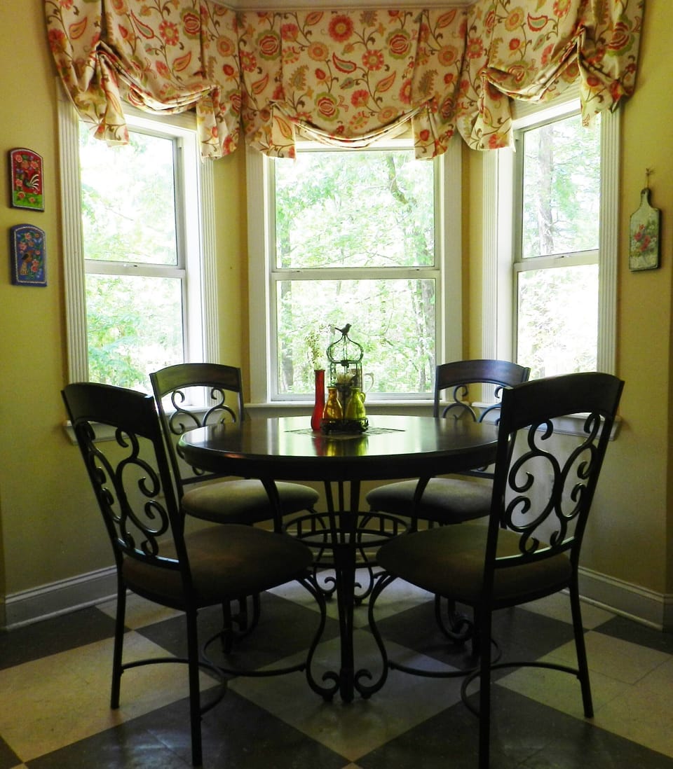 Breakfast table in kitchen area.