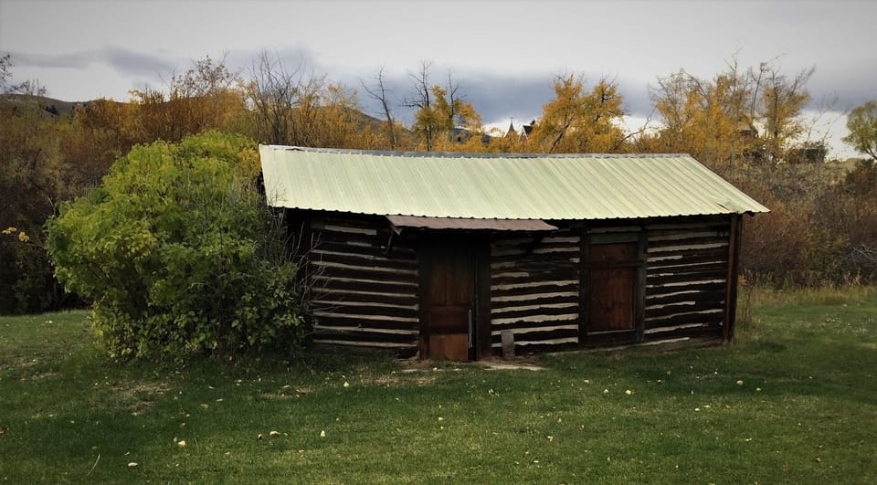 Historic Log Home steps from the house.