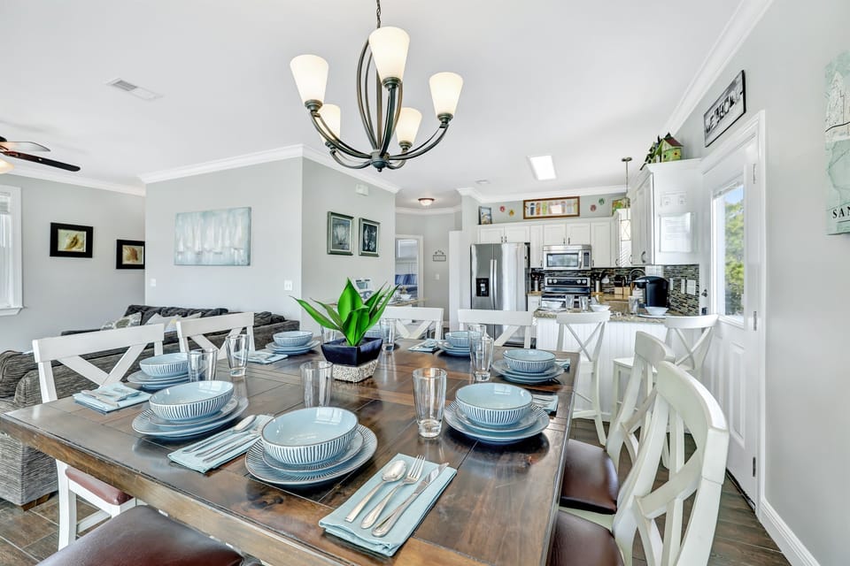 Kitchen table seating for 8 with 4+ additional seating at bar area.