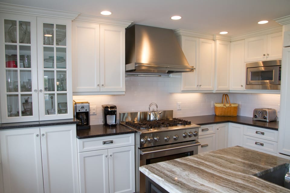 Kitchen is Equipped with a Professional 6 Burner Duel Fuel Range and Hood