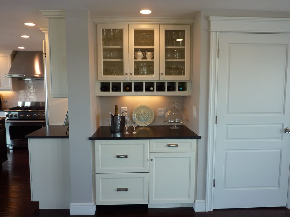 Bar Area with Glass Cabinets, Wine Rack and Double Door Beverage Refrigerator