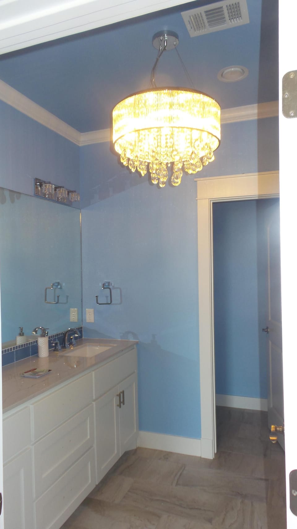 The master bath is beautiful with double sinks and a spectacular shower.