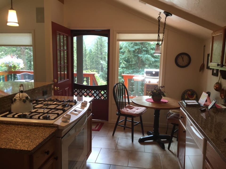 Dining nook next to window and kitchen 