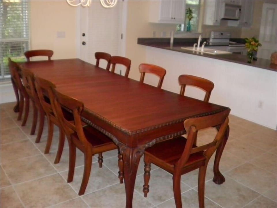Antique dining room suite with seating for ten
