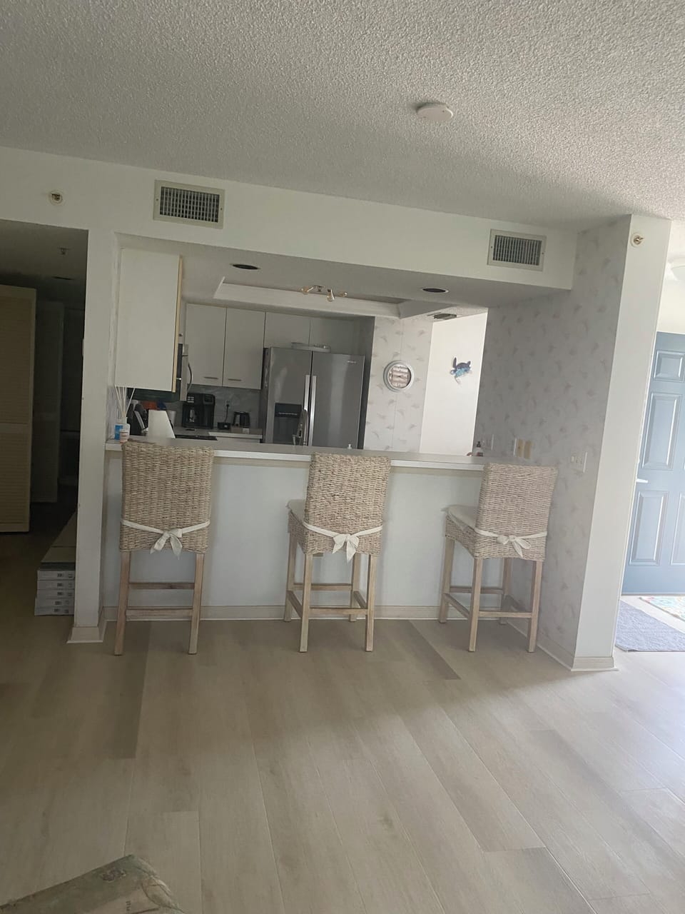 Entry door (on right) features retractable screen door.
