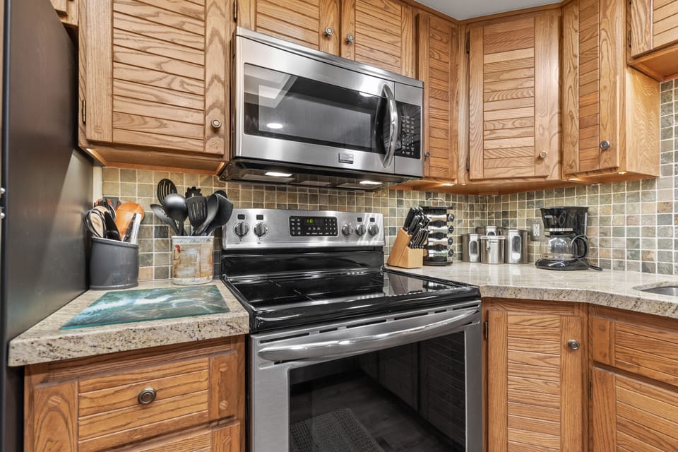 Kitchen with induction cooktop and conventional/convection oven