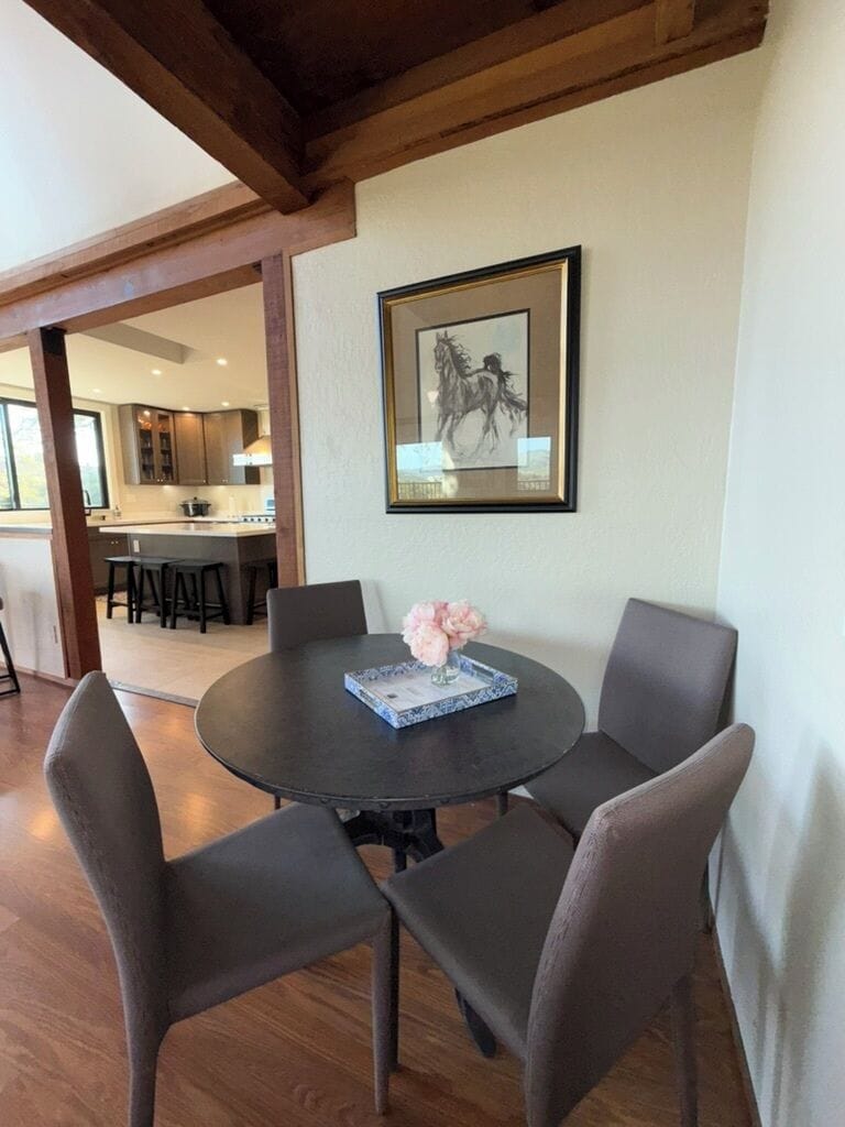 Extra seating in great room - bar table seats two and this round table seats 4