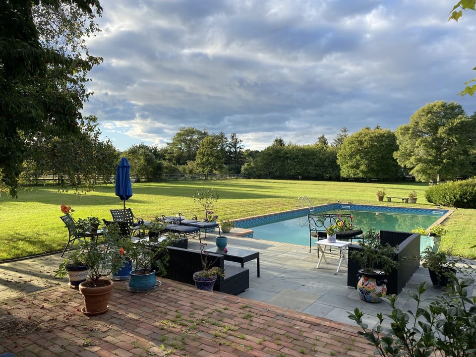 View in summer of heated, pool and terrace