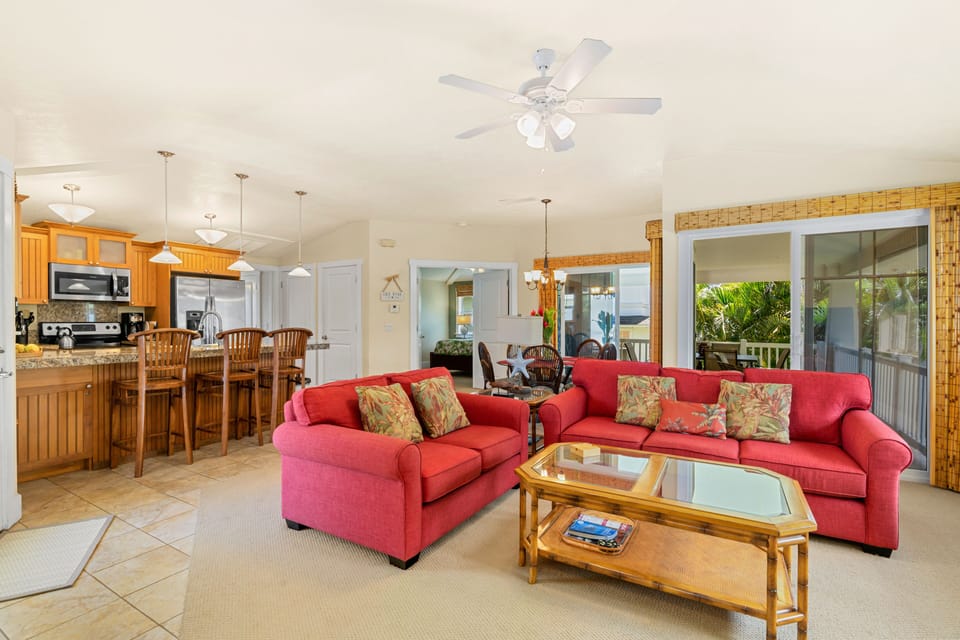Looking In-Living area, kitchen, dining area and out to lanai