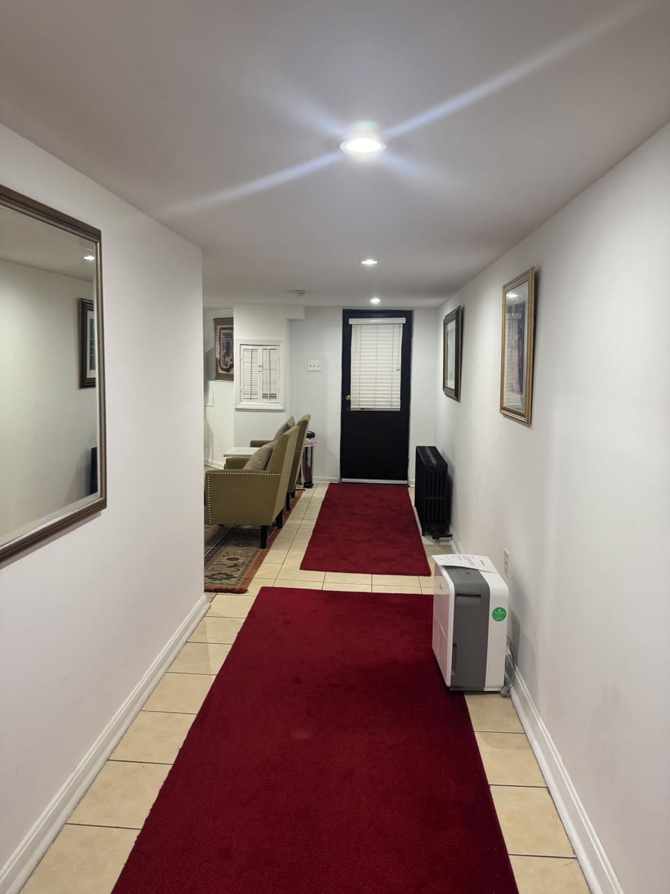 Hallway to 2 of 2 bdrms