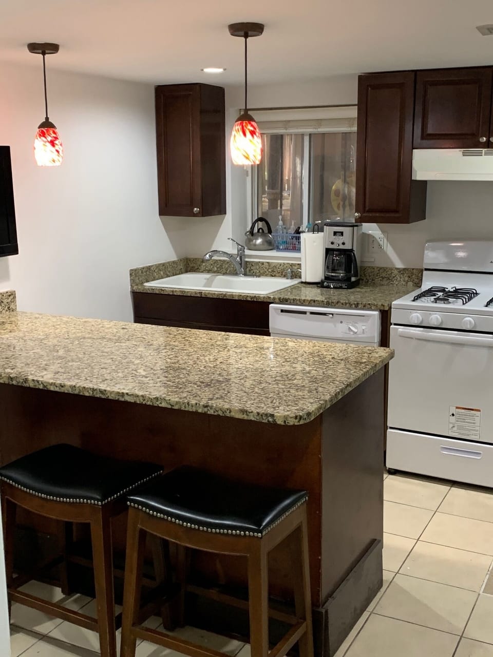 Natural Light, cozy bar lamps and recess lights in kitchen