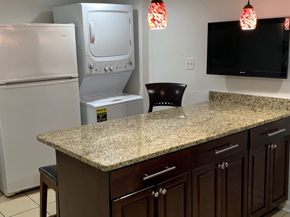 Washer and Dryer in kitchen