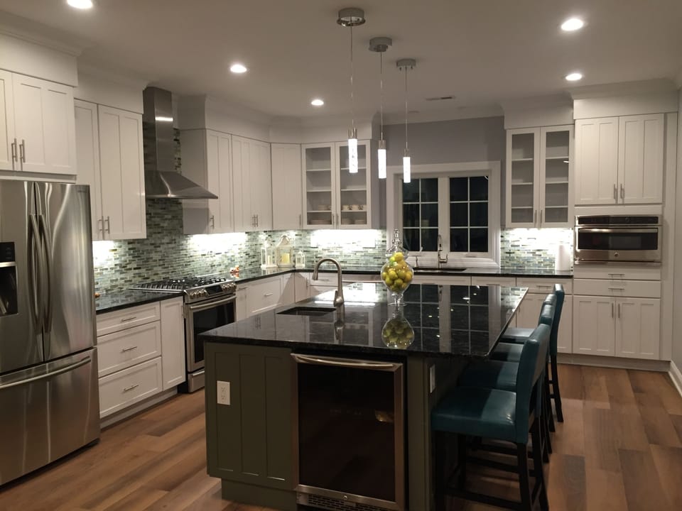 Great kitchen with lots of space, seating and work areas.