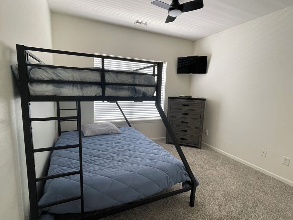 Queen bunk bed with twinXL on top.   