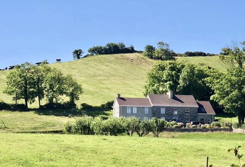 View of the house from the field below